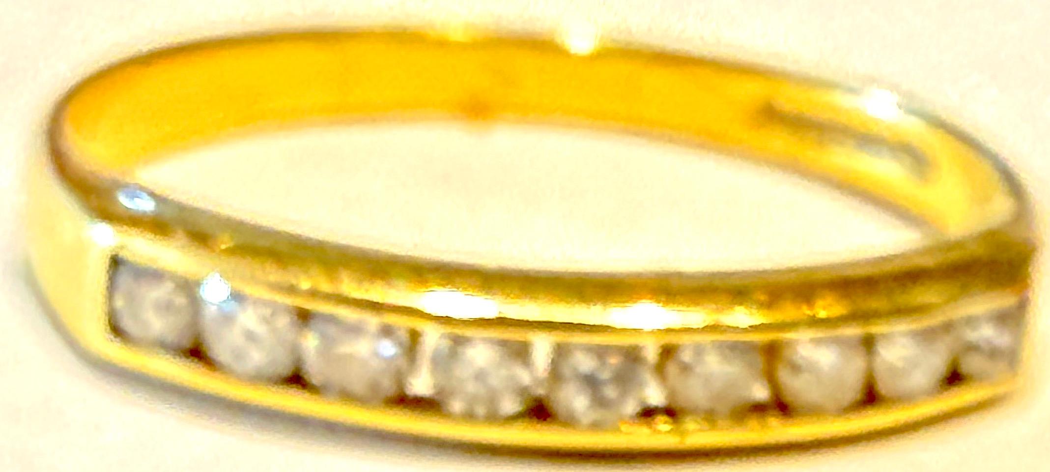 Hallmarked rings assure authenticity.  This is an antique Hallmarked Glasgow 1912,  18K half hoop yellow gold ring with nine 3 point full cut diamonds. If you are of Scottish heritage looking for  the perfect choice for an engagement or dress ring