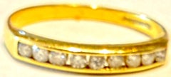 Hallmarked Glasgow 1912, 18K half hoop yellow gold ring with 9 full cut diamonds