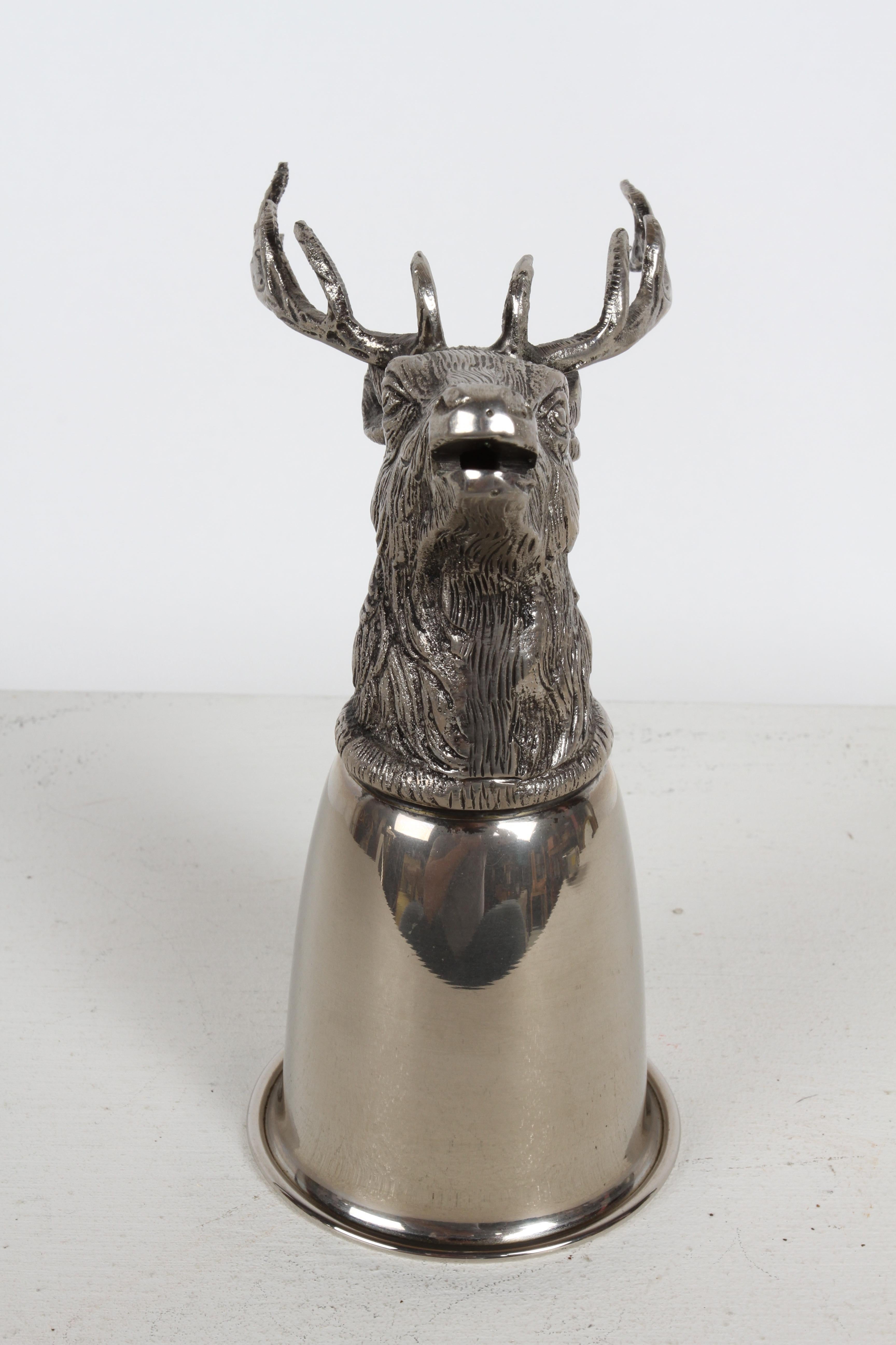 Circa 1970s Hallmarked Gucci - Italy Silver-Plated Elk Head hunting equestrian theme stirrup cup. 
This drinking / vessel cup can rest on the head or be displayed turned over with the head clearly visible, as a trophy / sculpture piece on your bar.