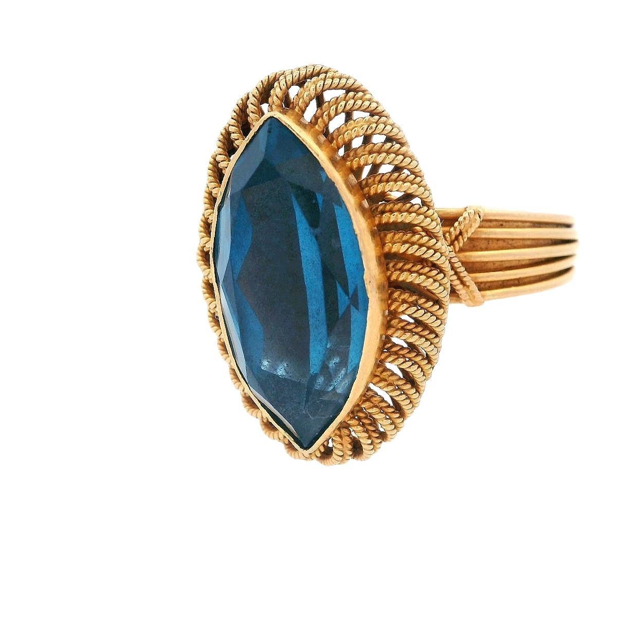Bague rétro de 1950 poinçonnée en or jaune 18 carats avec topaze bleue Unisexe en vente