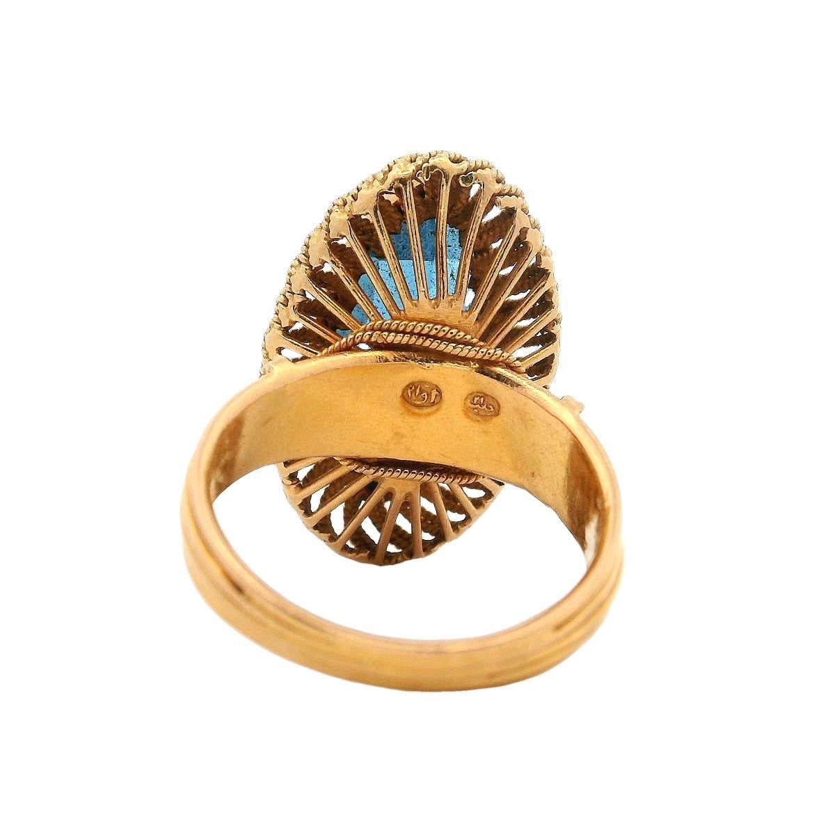 Bague rétro de 1950 poinçonnée en or jaune 18 carats avec topaze bleue en vente 1