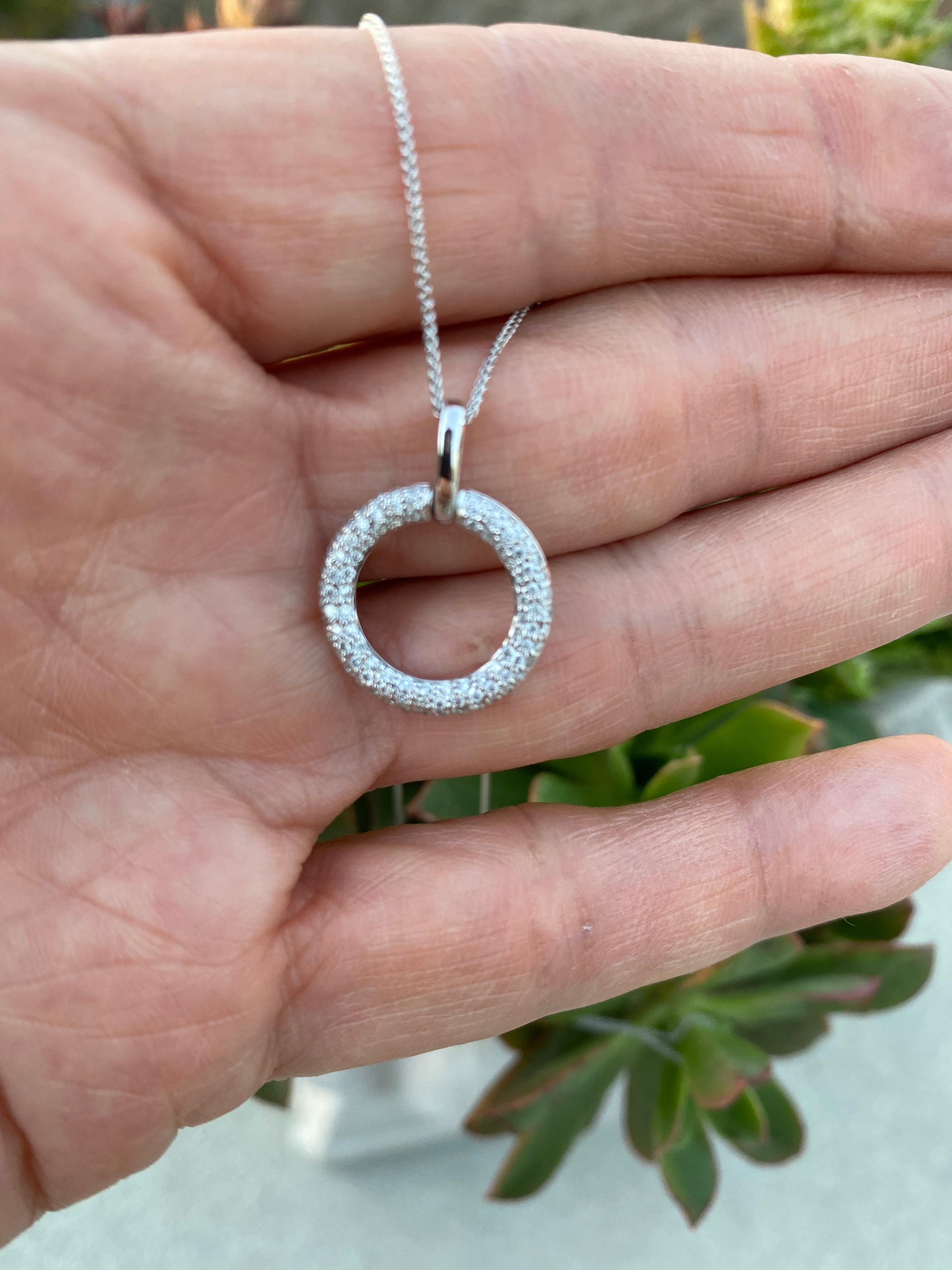 Halo Diamond Pendant VS-G Quality White Gold

The pendant is a half dome shape with 100 round micro-pave set diamonds 
The quality pendant is measuring .62