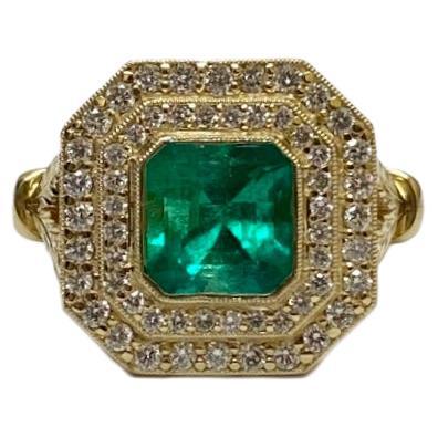 DeKara Designs Collection

Metal- 14K Yellow Gold, .583.

Stones- 1 GIA Certified Colombian Emerald 1.95 Carats, 56 Round Diamonds F-G Color VS1-VS2 Clarity 0.61 Carats.

GIA Report Number 5221040229

An amazing handmade halo diamond engagement ring