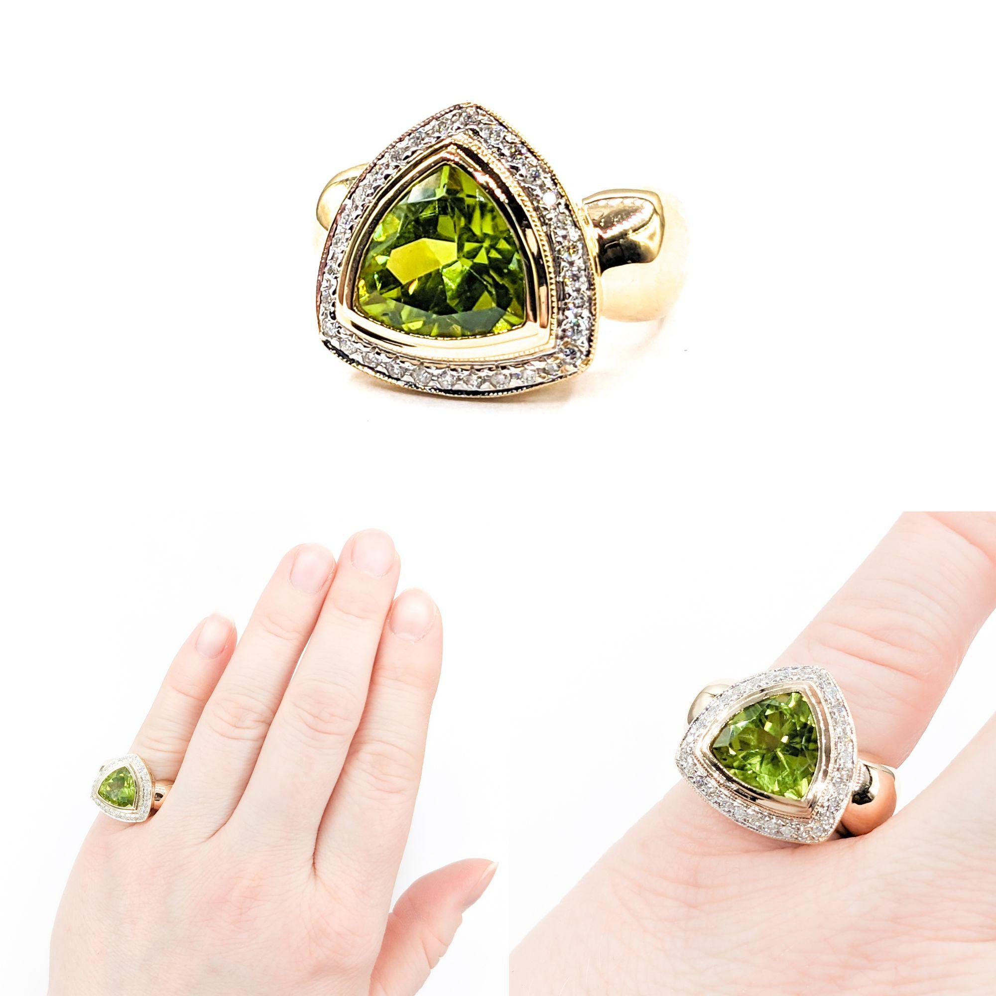 Halo 3.25ct Peridot & Diamonds Ring In Yellow Gold


This magnificent gemstone fashion ring is expertly crafted in 14kt yellow gold, featuring a radiant 3.25ct peridot centerpiece that captivates with its vibrant green hue. Encircled by a halo of