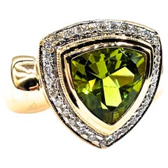 Halo 3,25ct Peridot & Diamanten Ring in Gelbgold