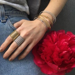 Bracciale Halo in oro giallo 18 carati