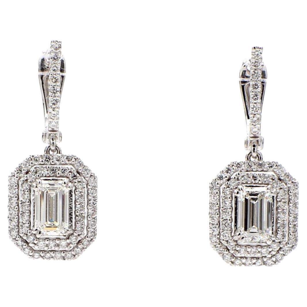 Halo Dangling Earrings w/ GIA J/IF-VS2 Emerald Cut Diamond Centers. D2.99ct.t.w. For Sale