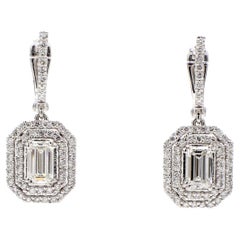 Boucles d'oreilles pendantes en halo avec centres en diamant taille émeraude GIA J/IF-VS2. D2.99ct.t.w.