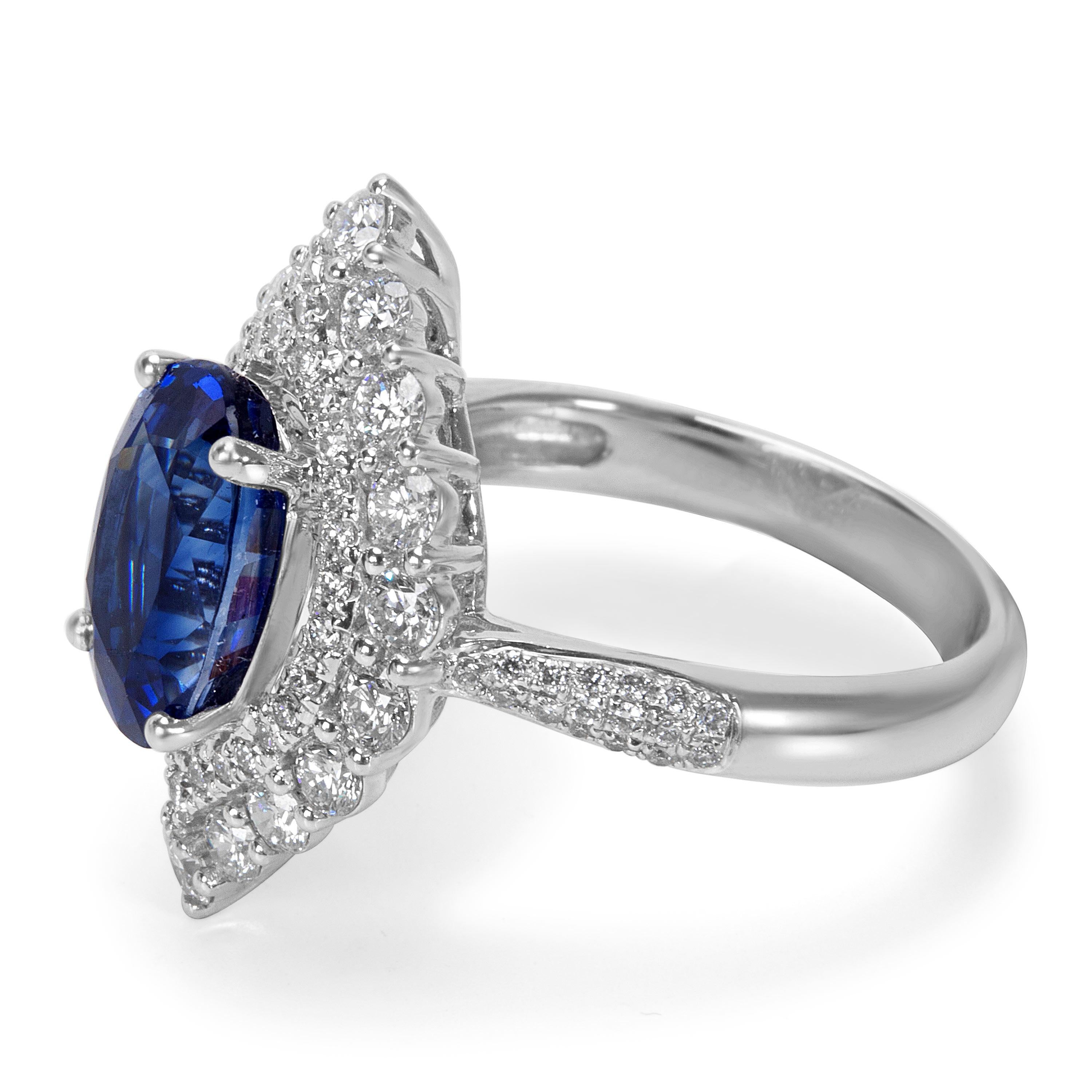 Halo Diamond and Oval Sapphire Ring in 18 Karat White Gold, 5.34 Carat In Excellent Condition In New York, NY