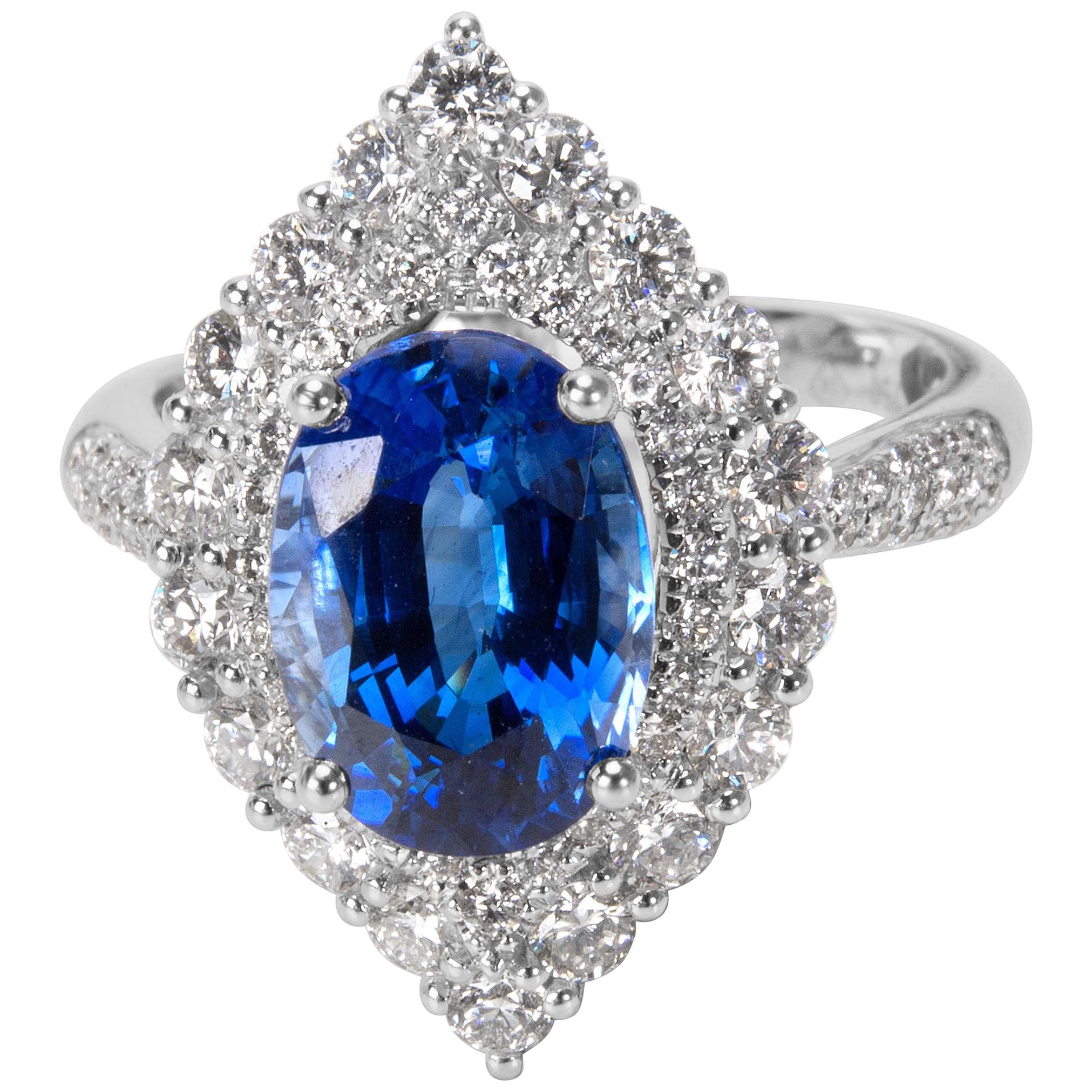Halo Diamond and Oval Sapphire Ring in 18 Karat White Gold, 5.34 Carat