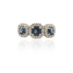 Halo Diamond and Three-Stone Blue Sapphire Ring in 14k Solid White Gold