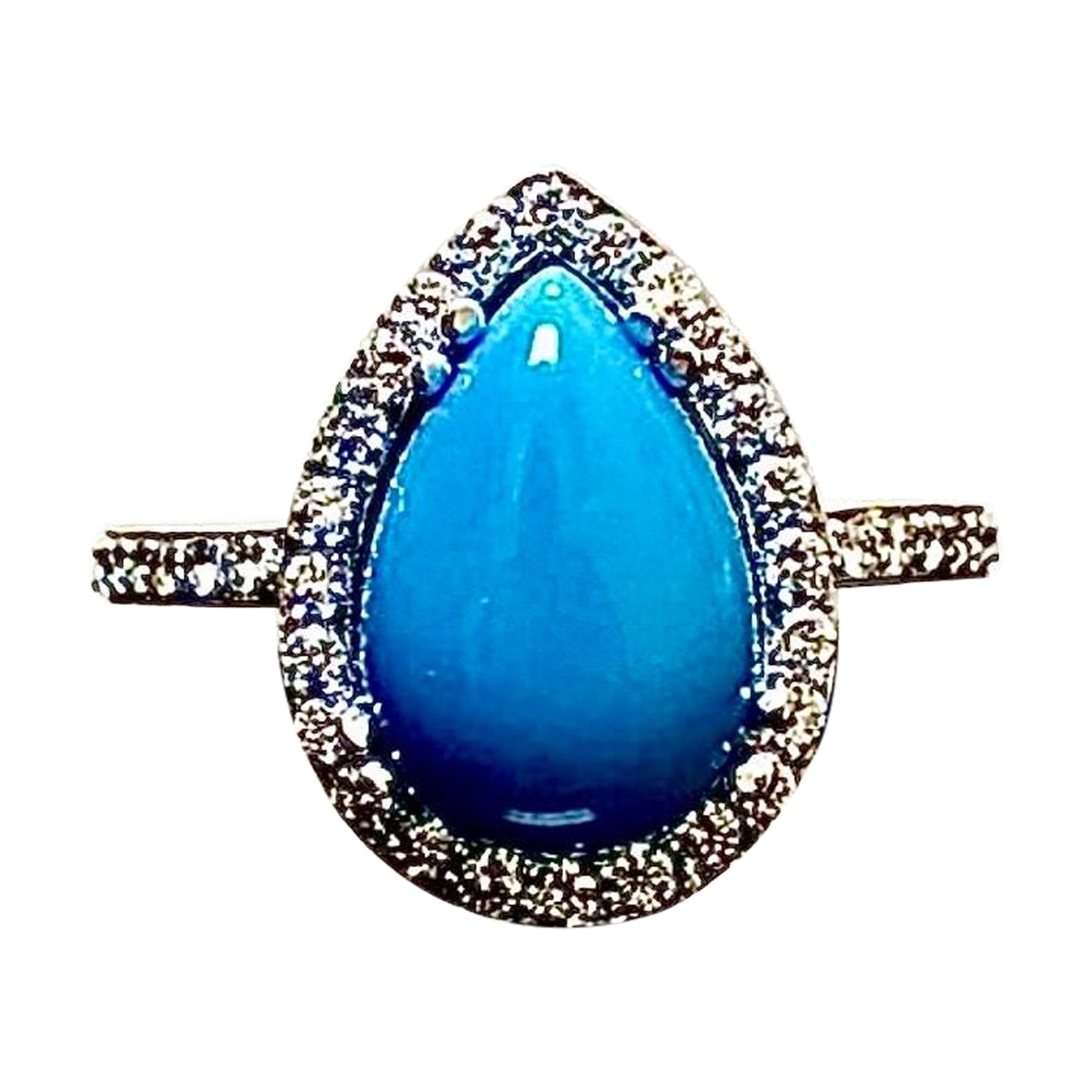 Anello di fidanzamento con diamante Halo in platino a forma di pera con turchese della Bella Addormentata