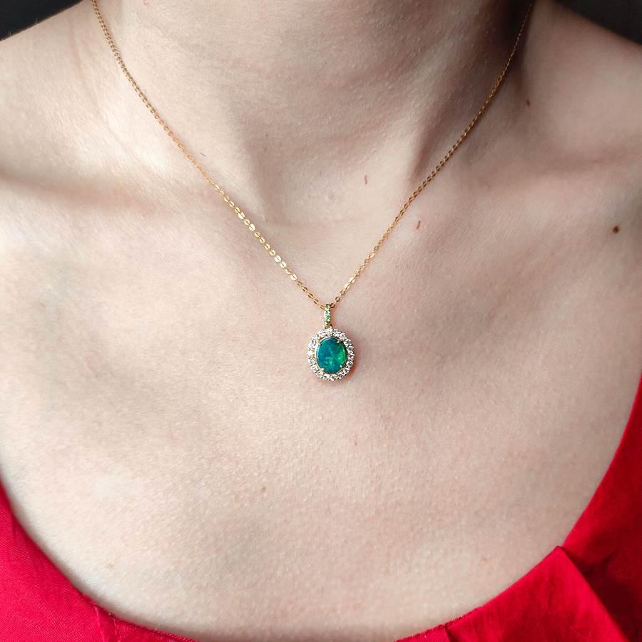 Halo Diamond Tsavorite Australian Black Opal Pendant Necklace 18k Yellow Gold.


Free Domestic USPS First Class Shipping! Free Gift Bag or Box with every order!

Opal—the queen of gemstones, is one of the most beautiful gemstones in the world. Every