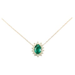 Halo Emerald & Diamond Necklace in 10k Yellow Gold
