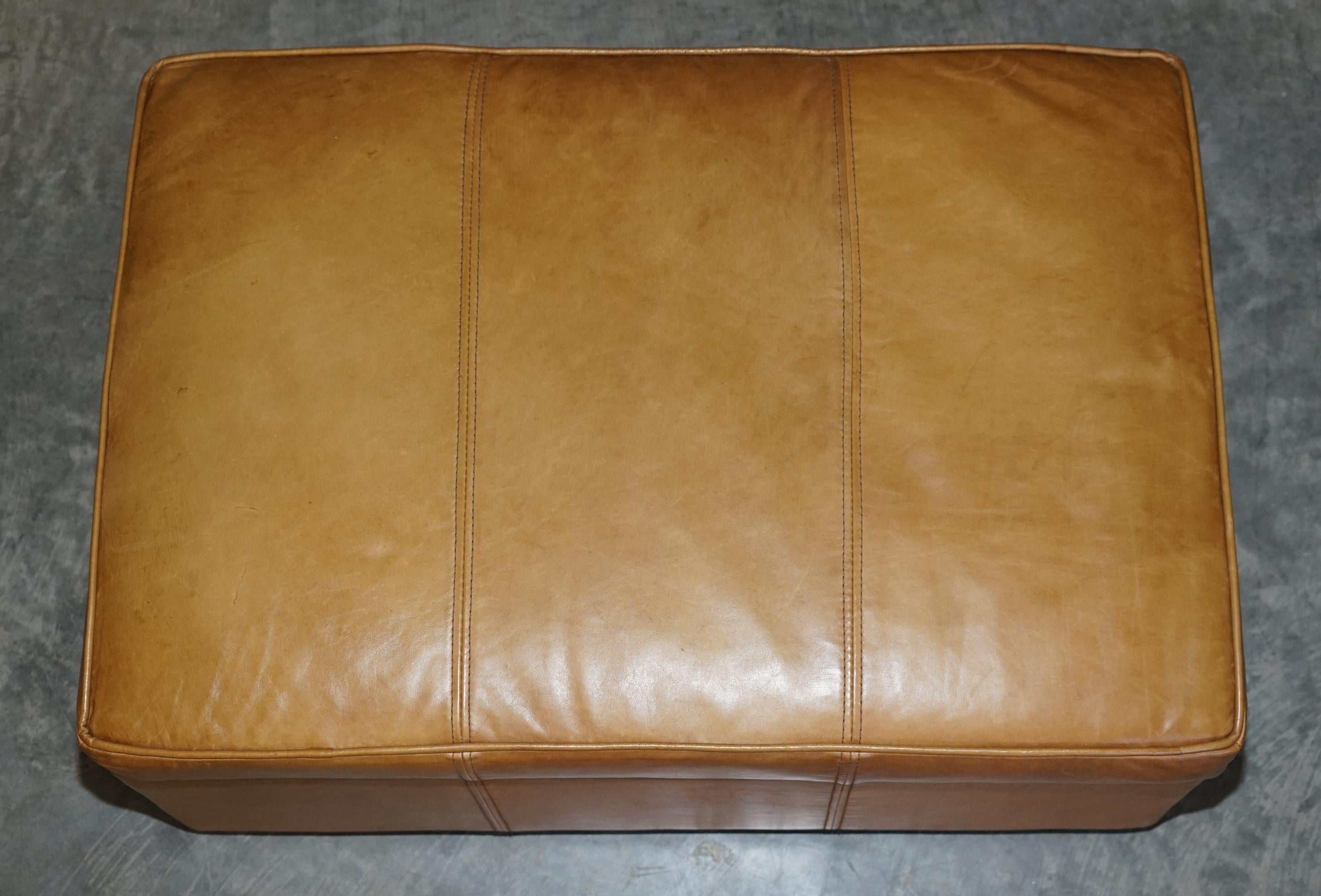 tan leather footstool