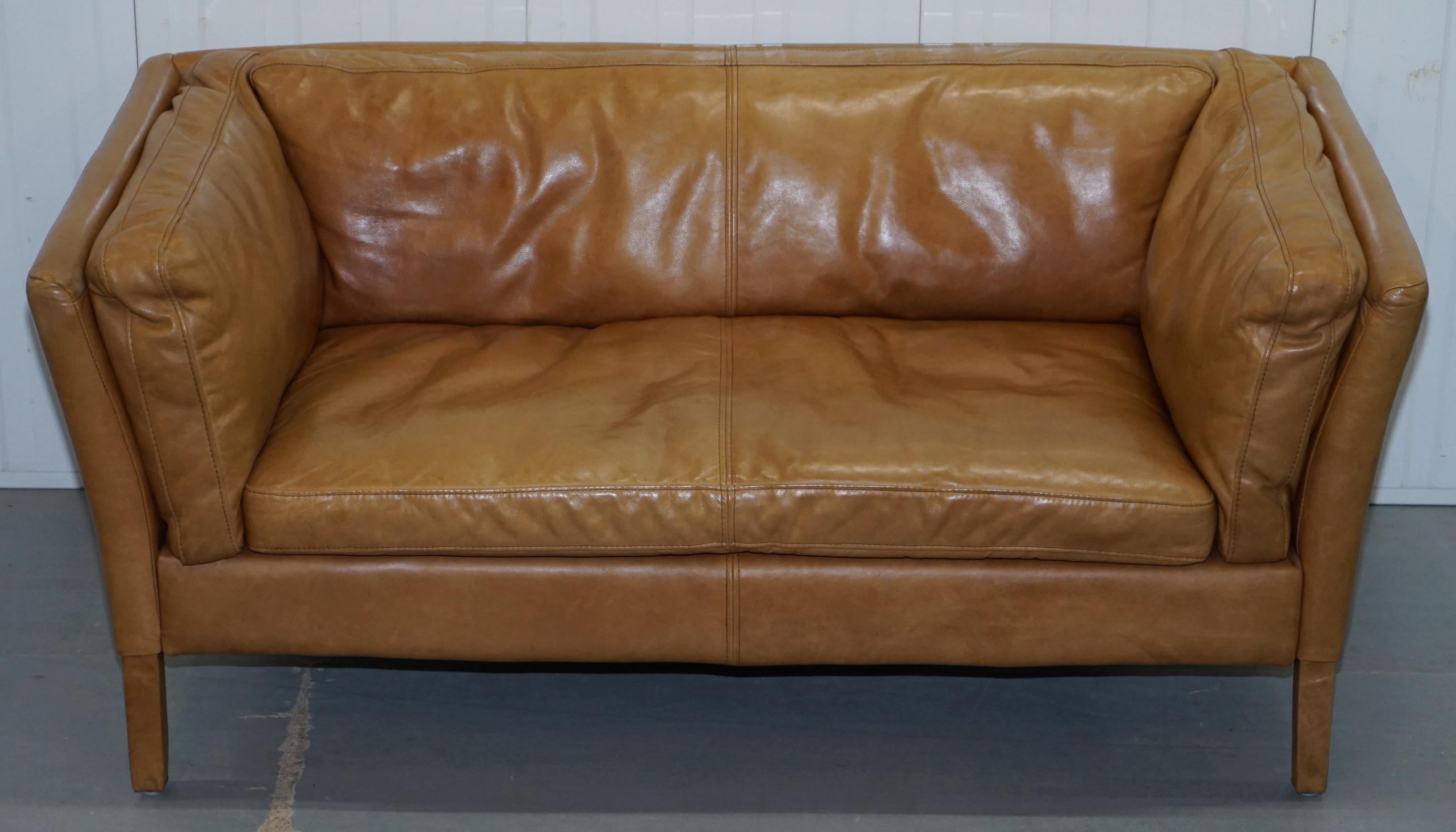 We are delighted to offer for sale this stunning lovely Halo Groucho Napinha Camel brown leather small 2-seat sofa RRP £1349 through John Lewis

I have the matching armchair listed under my items, it’s the exact same model and colour 

The sofa