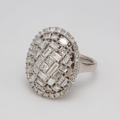 Halo Oval Shaped Ring with Assorted Shaped Diamonds. D2.87ct.t.w.