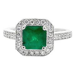 Halo Ring Set in 14K White Gold with 1.19 Carat Emerald and Round Diamonds