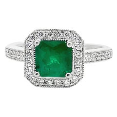 Halo Ring Set in 14K White Gold with 1.19 Carat Emerald and Round Diamonds