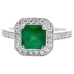 Halo Ring Set in 14K White Gold with 1.19 Carat Emerald and Round Diamonds