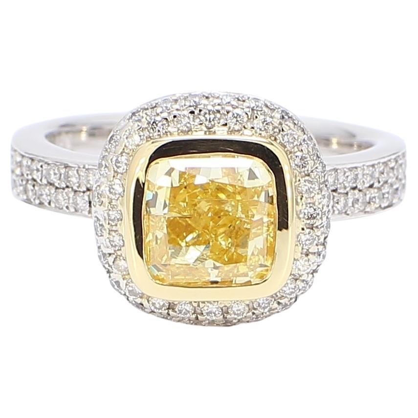 Halo Ring w/ GIA Certified FIY/I1 2.01ct. Cushion Cut Diamond.  D2.57ct.t.w. For Sale