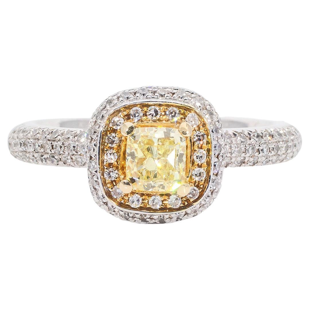 Halo Ring w/ Fancy Yellow 0.52ct. Cushion Diamond Center.  D0.99ct.t.w. For Sale