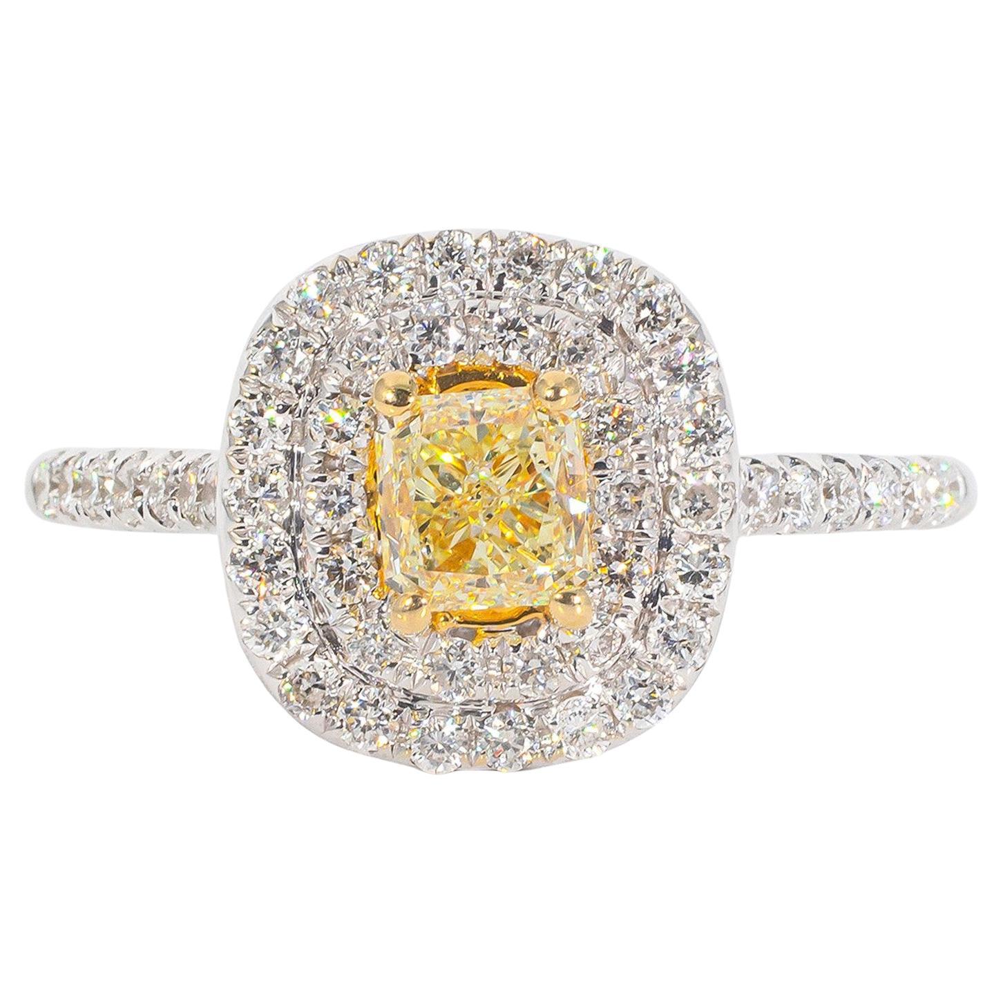 Halo Ring with Fancy Yellow Radiant Cut Diamond Center.  D1.08ct.t.w.
