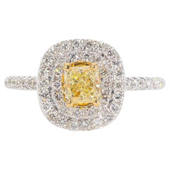 Halo Ring with Fancy Yellow Radiant Cut Diamond Center.  D1.08ct.t.w.