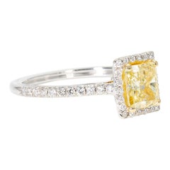 Halo Ring with Fancy Yellow/SI1 GIA Radiant Cut Diamond Center. D1.30ct.t.w.