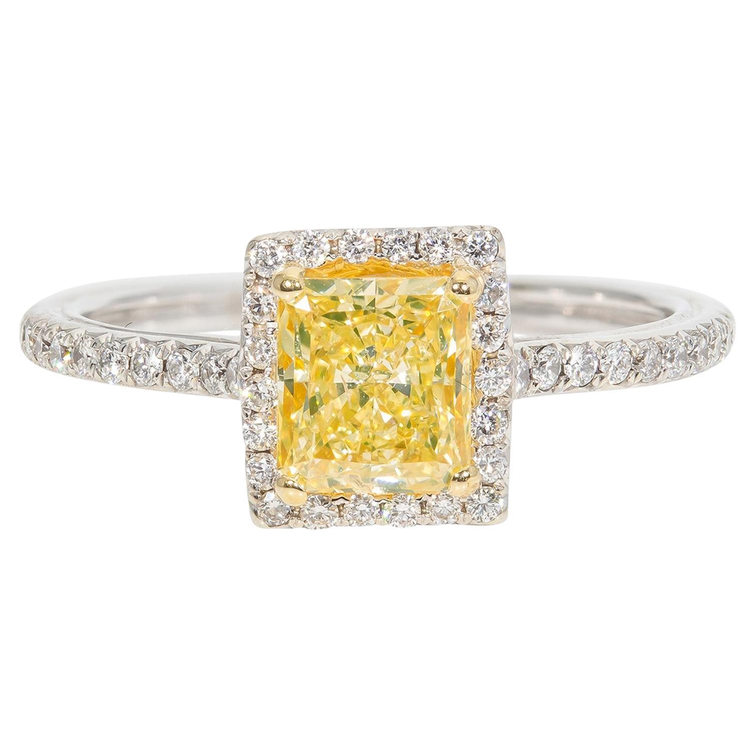 Halo Ring with Fancy Yellow/SI1 GIA Radiant Cut Diamond Center. D1.30ct.t.w.