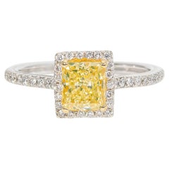 Halo Ring with Fancy Yellow/SI1 GIA Radiant Cut Diamond Center. D1.30ct.t.w.