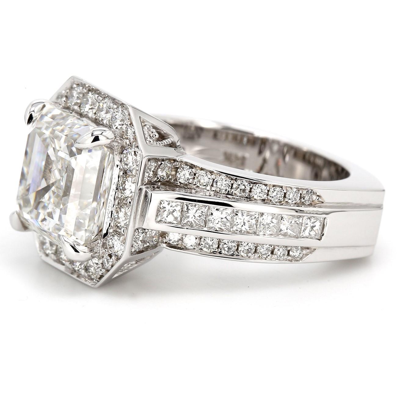 Halo ring in 14K white gold with pave set rounds and a GIA certified H/SI2 asscher cut diamond center stone. D6.51ct.t.w. (Center - 5.01ct.)