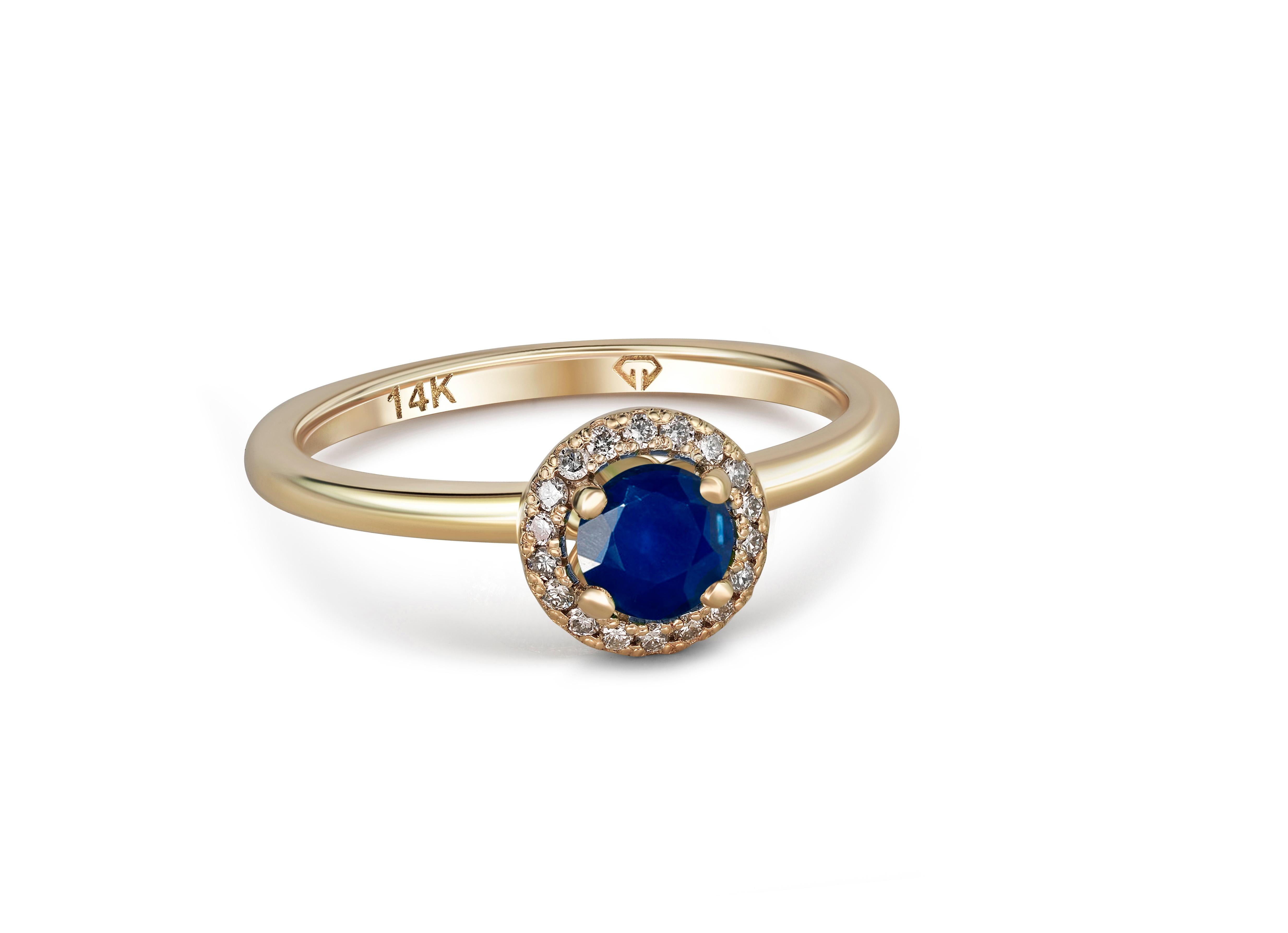 Women's Halo Sapphire Ring with Diamonds in 14 Karat Gold.  For Sale