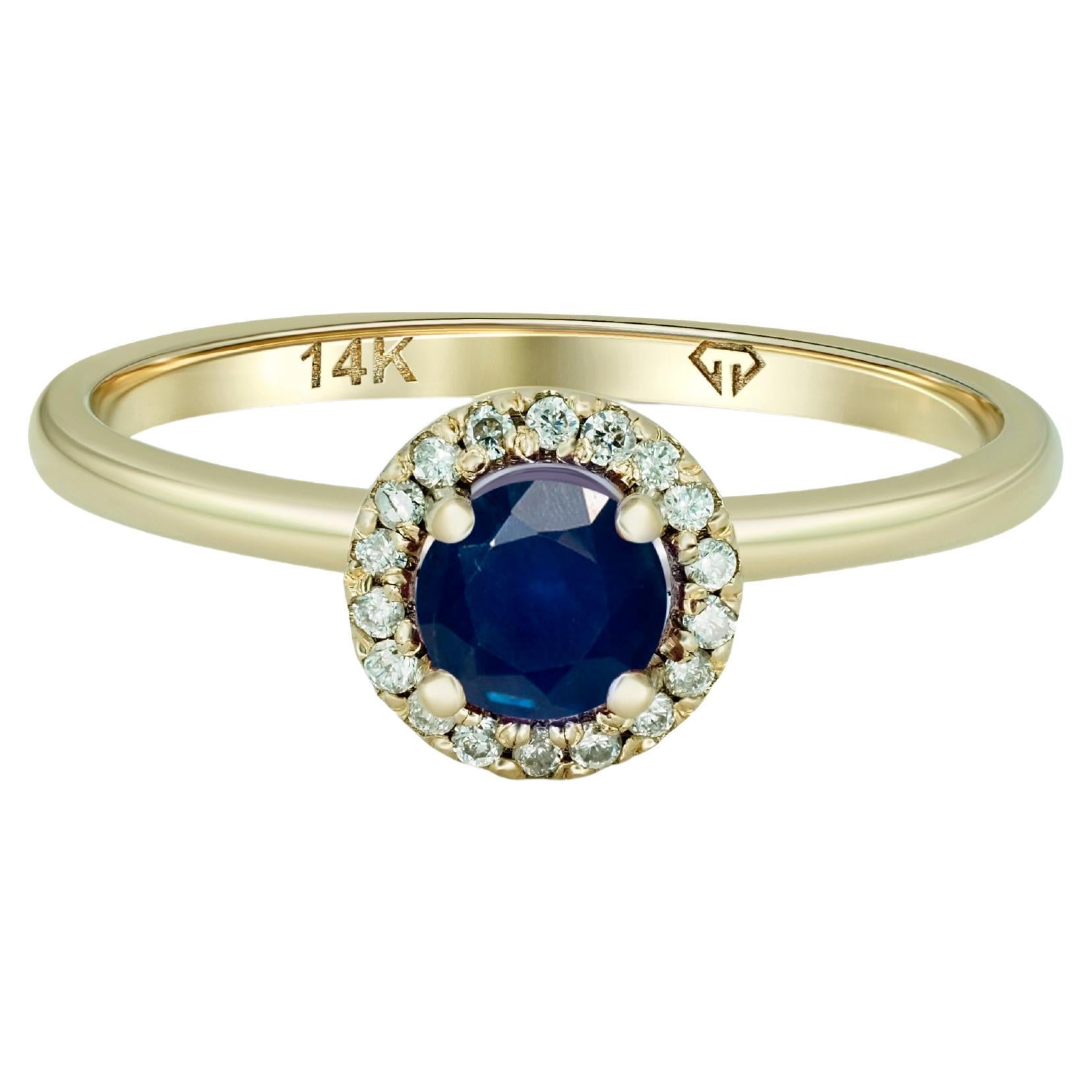 Halo Sapphire Ring with Diamonds in 14 Karat Gold.  For Sale