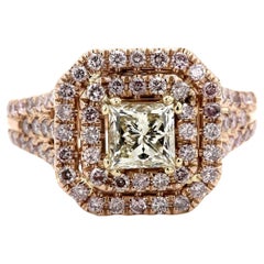 Halo Split Shank Ring with Q-R/VS1 GIA Princess Cut Diamond Center. D2.20ct.t.w.