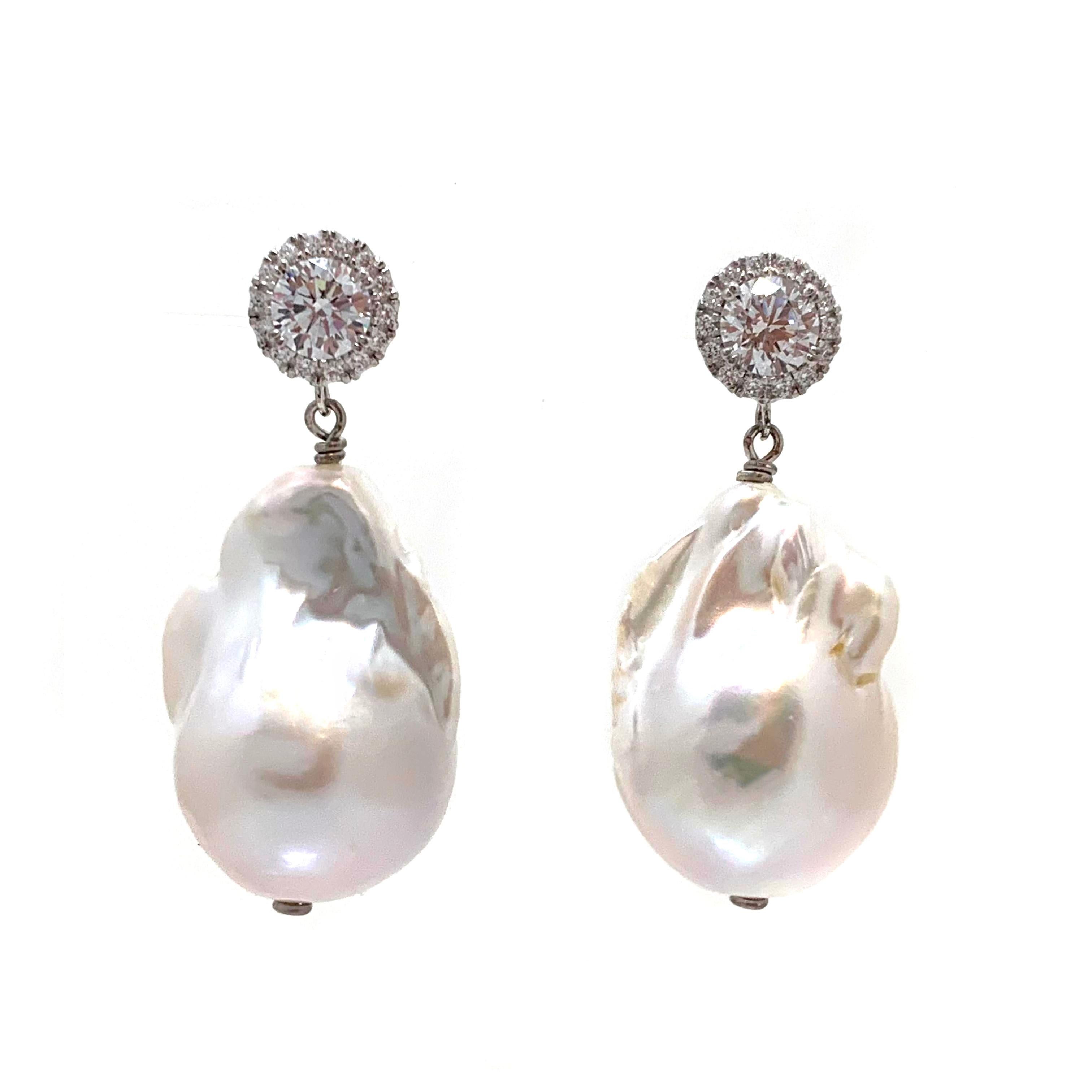 Beautiful pair of large lustrous freshwater baroque pearl drop earrings with simulated diamond on top! 

The pearls measure 18mm width and 25mm height. Top part is 1ctw halo simulated diamond cz, handset in platinum rhodium plated sterling silver -