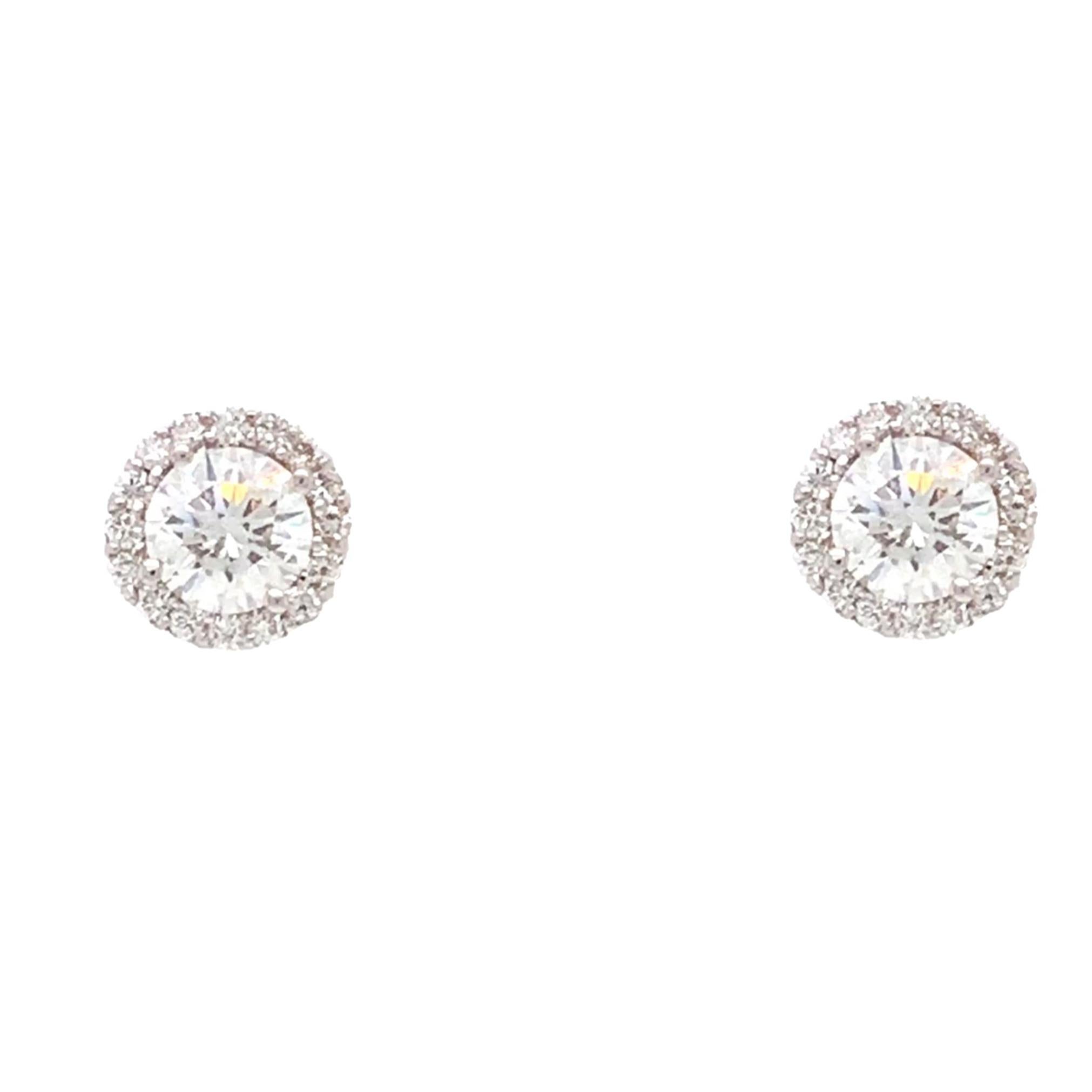 Art Deco Halo Stud Round Brilliant Cut Diamond Earrings 0.85cts T.W. 18k White Gold For Sale