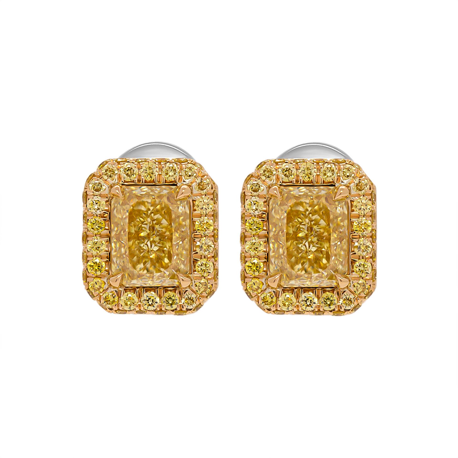 Double edge halo studs with 2 GIA Certified Radiant Diamonds in 18K Yellow Gold 
1.05ct Natural Fancy Intense Yellow Even IF Radiant Shape Diamond GIA#6224285629 
1.00ct Natural Fancy Intense Yellow Even VS2 Radiant Shape Diamond