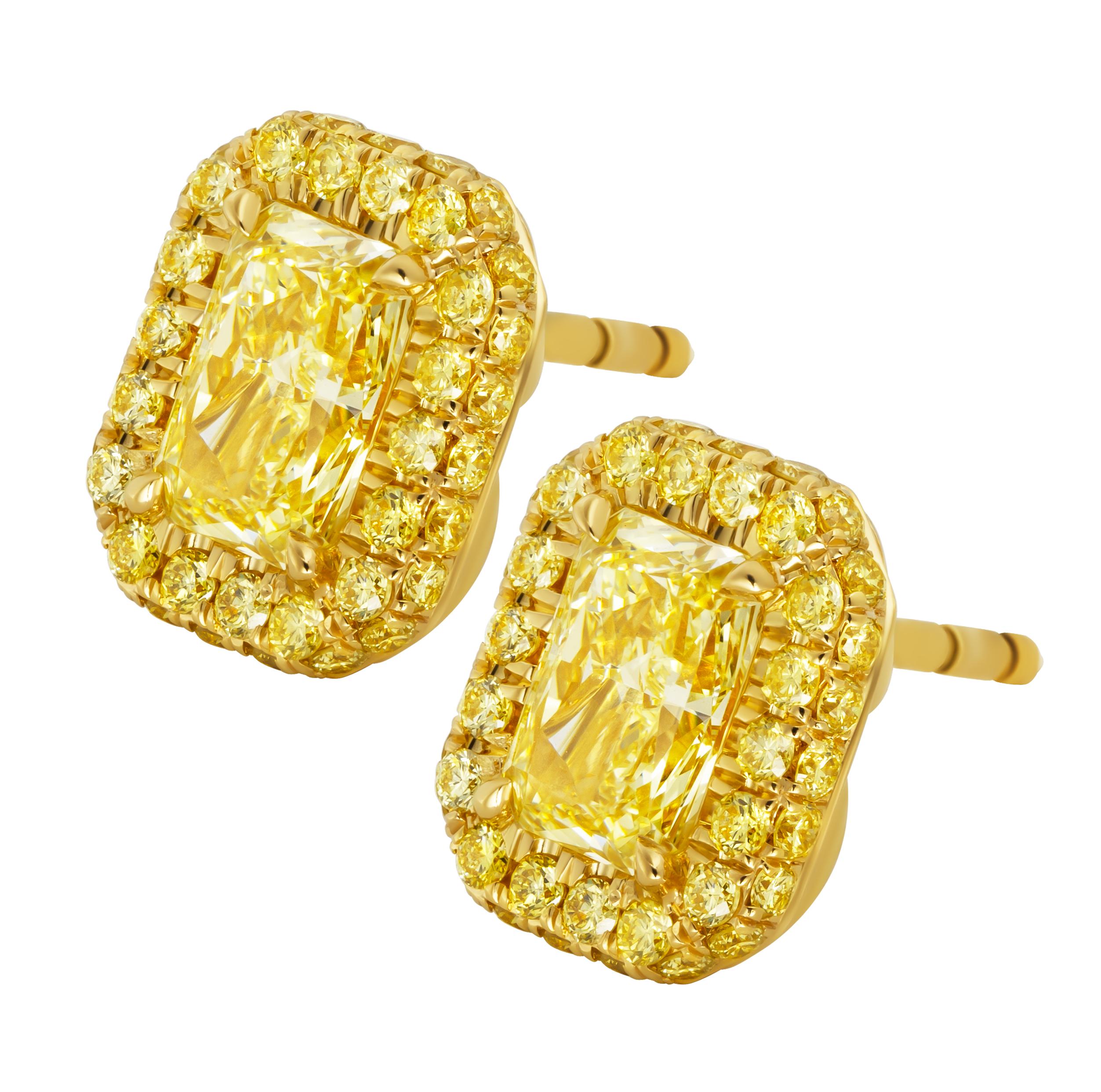 Halo studs with Fancy Intense Yellow Diamonds
Double edge halo with yellow pave studs totaling 2.13ct
Mounted in 18K Yellow Gold
Center Stones:
1.05ct Natural Fancy Intense Yellow Even IF Radiant Shape Diamond GIA#6224285629 1.00ct Natural Fancy