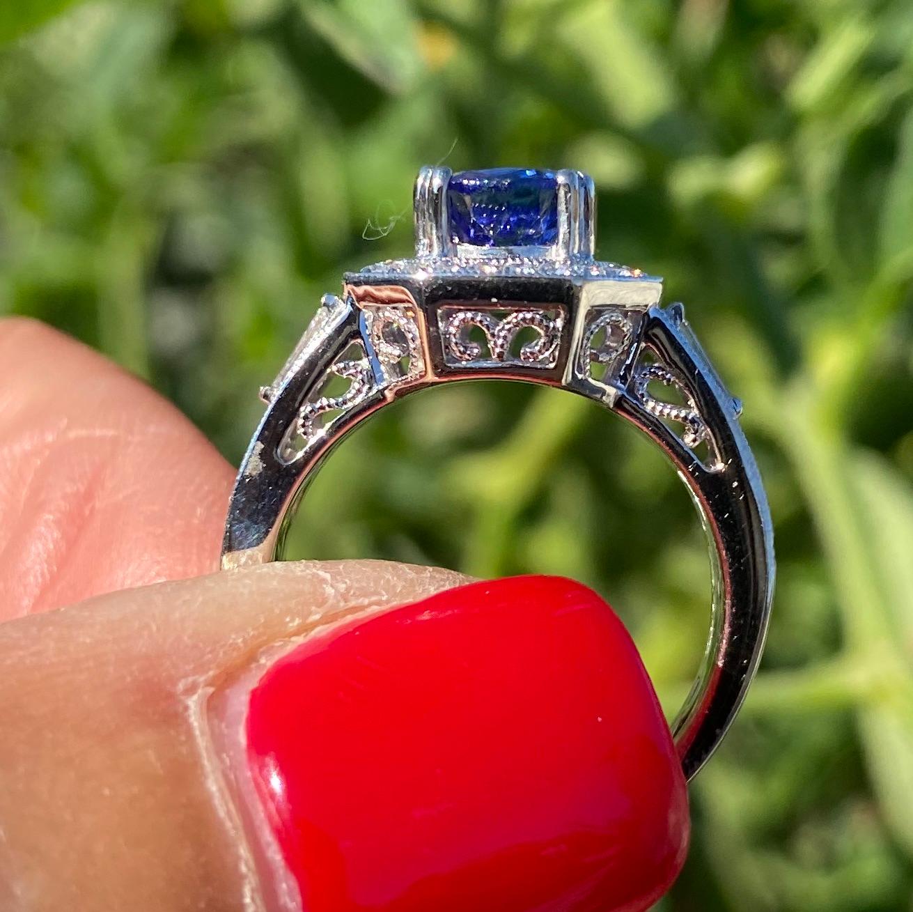 Halo Tanzanite and Diamond Ring, 2.70 Carat VS Quality 18 Karat For Sale 1