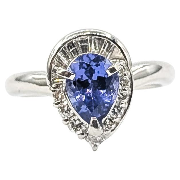 Halo Tanzanite & Diamond Ring in Platinum