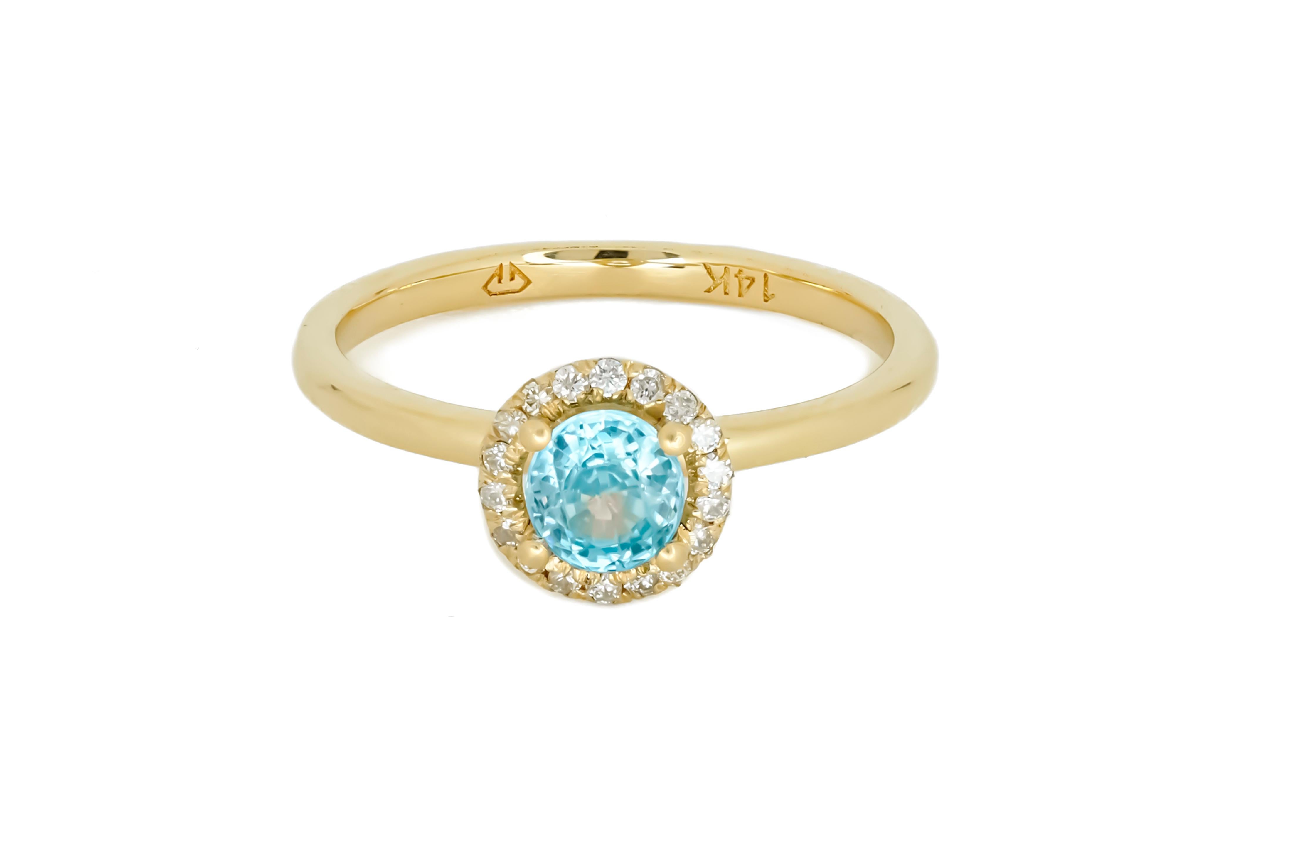 Halo topaz Ring with Diamonds in 14 Karat Gold. 
Topaz gold ring. Topaz engagement ring. Round topaz ring. Everyday topaz ring.

Metal type: Gold
Metal stamp: 14k Gold
Weight: 2 gr - depends from size.

Central gemstone:
Topaz round shape, blue