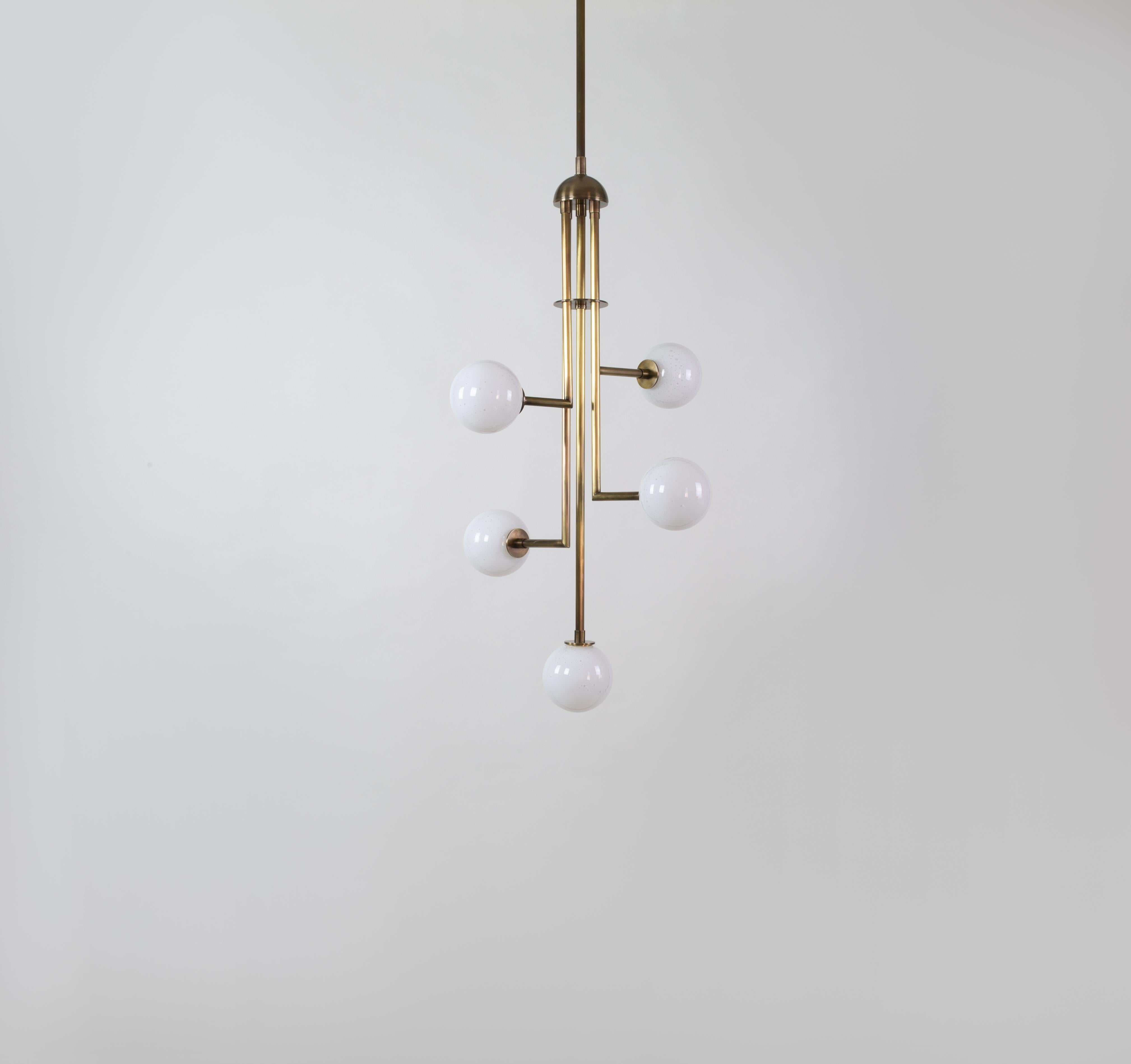 Kalin Asenov designs and fabricates lighting in Savannah, GA. Asenov works with a team of artisans and manufacturers to prototype, and build all pieces in his studio.

The design of Halo interprets ideas of celestial secret geometry; the form