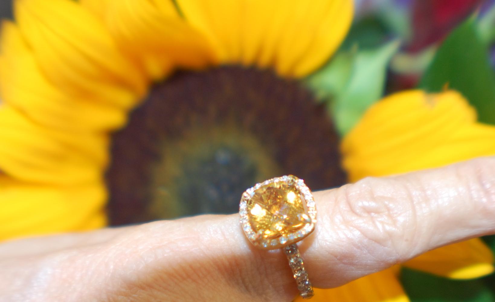 Halo Yellow Citrine and Diamond Ring, Beautiful Tapestry Cushion Center Stone Radiates Sparkle 
 14 Karat Yellow Gold

Center dynamic yellow Citrine is set in a diamond halo with diamonds on the rings side. 
The center stone measures 9 mm in