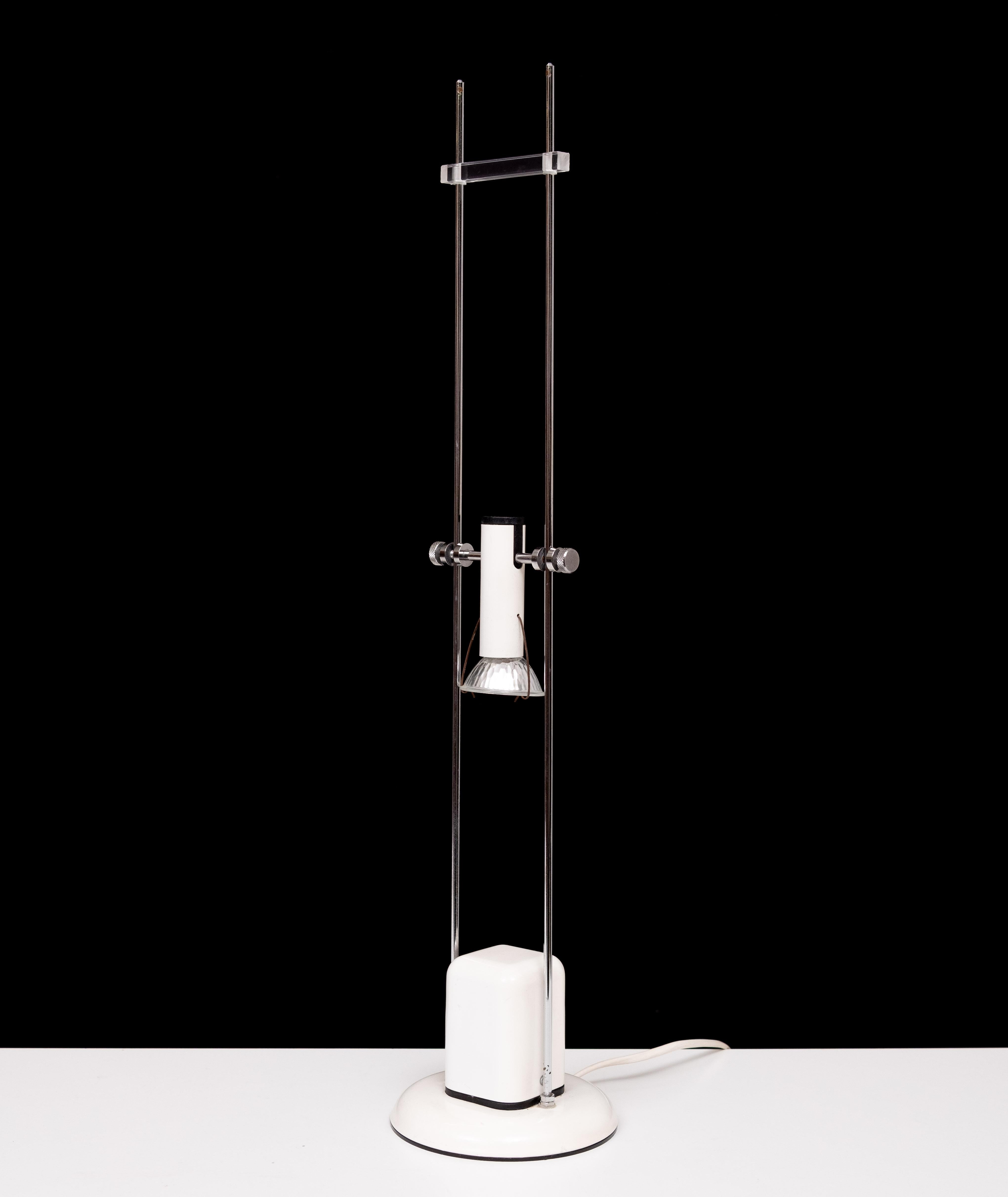 Very nice rare Halogen table lamp ,in White . adjustable in Height .
