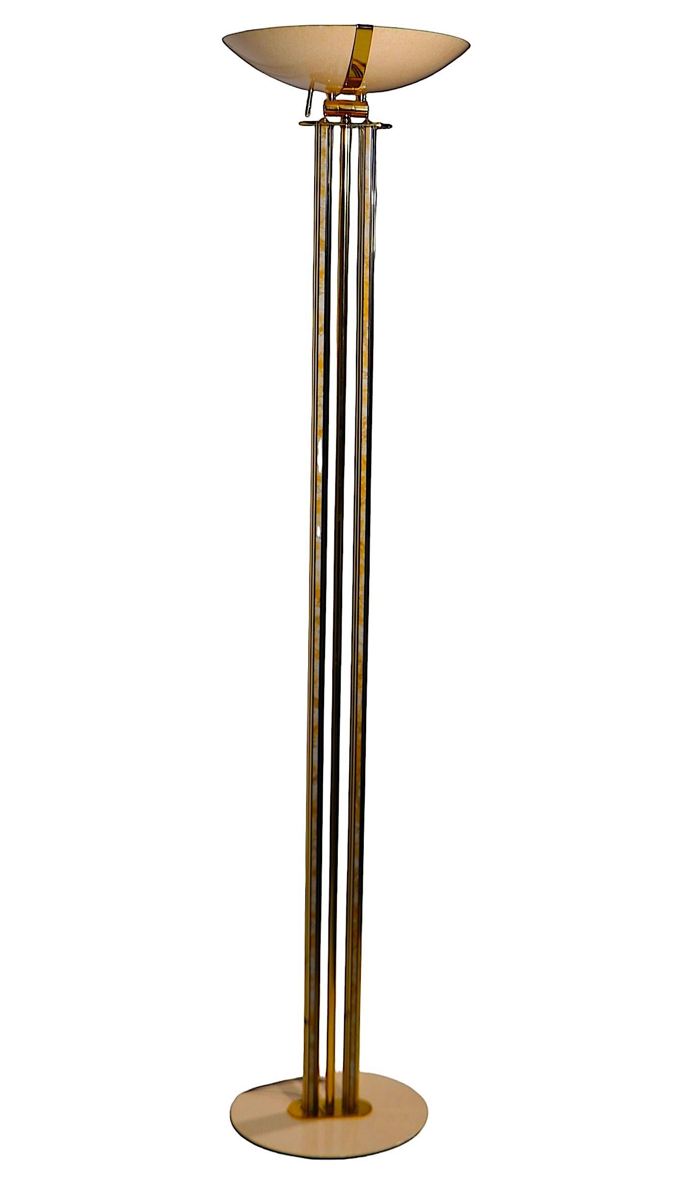 High end floor lamp, torchiere, uplight constructed of  brass, steel and faux marble, circa 1970/80's, probably made in France. The disk shade tilts to adjust and position  the light. 
 Exceptional quality design and construction, clean, working and