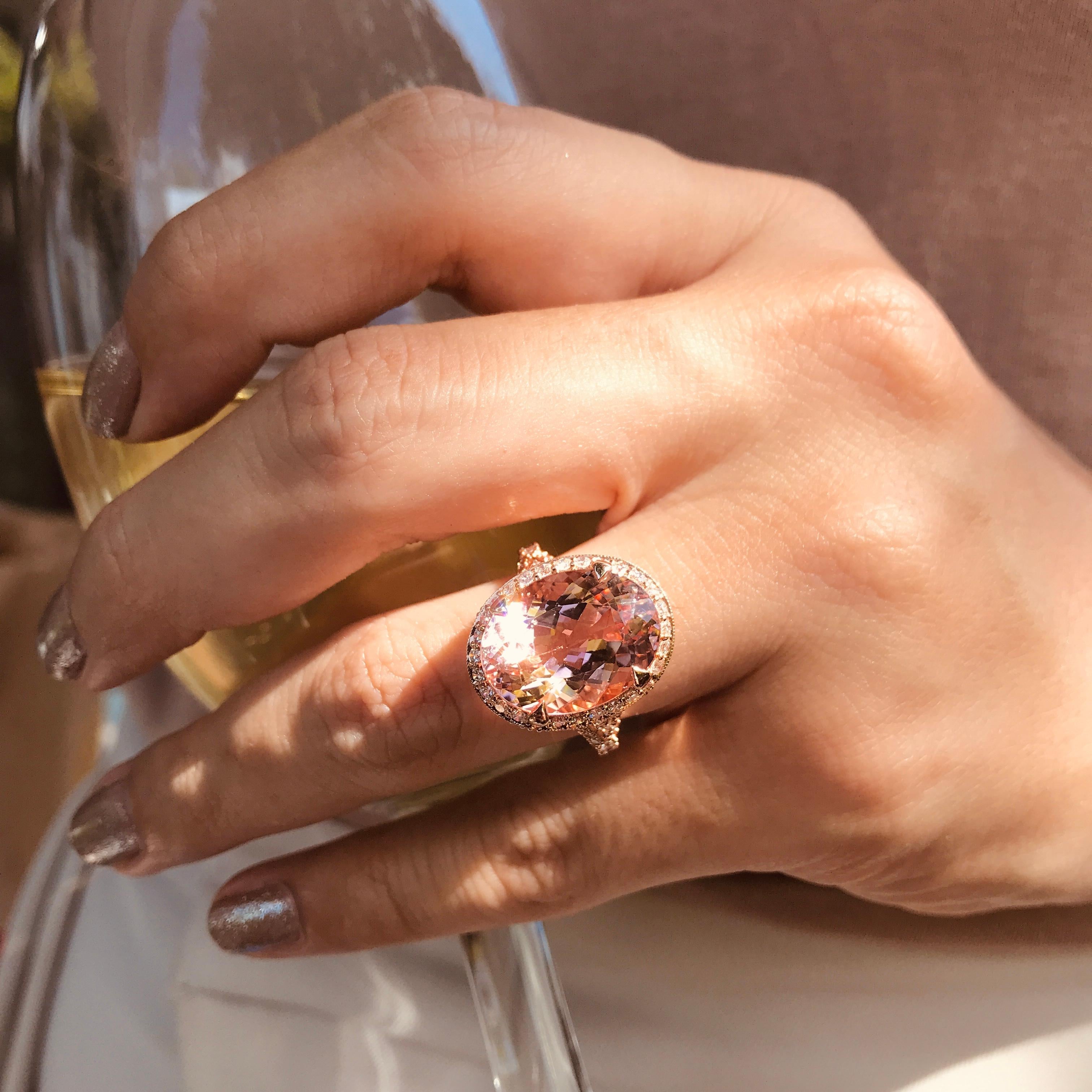 This stylish 9.60 ct. Oval Morganite and Diamond 18K Pink Gold Cocktail Ring will lend an eye-catching touch of sparkle to your look. Crafted in lustrous pink gold, the ring features an oval-cut morganite gemstone and 88 round-cut diamonds