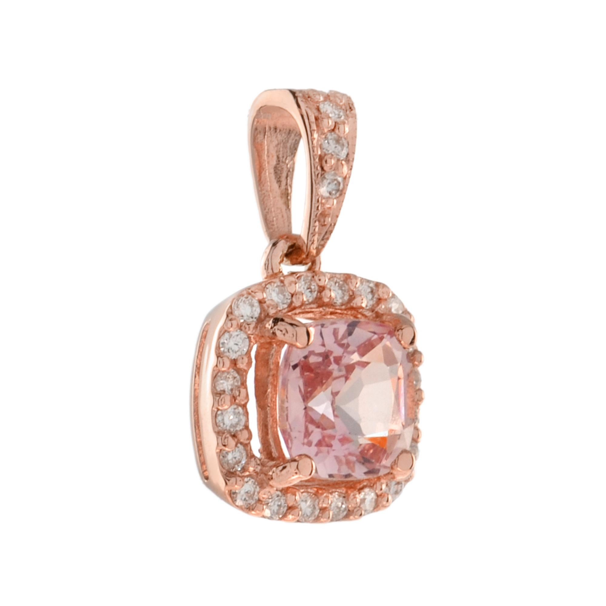 This gorgeous 14k rose gold halo pendant features a 1.50 carat cushion-cut morganite surrounded by a halo of tiny diamonds. An effortless upgrade to your accessary wardrobe. Wear it with our same design ring and earrings for your perfect look.