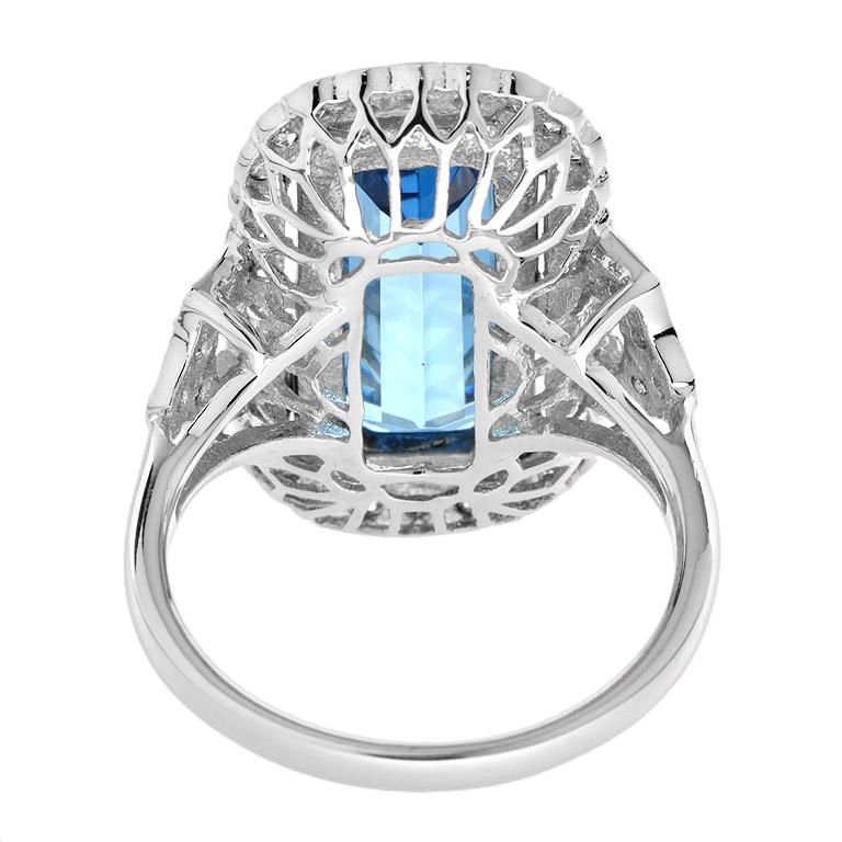 For Sale:  Halona Emerald Cut Blue Topaz with Diamond Halo Ring in 18K White Gold 4
