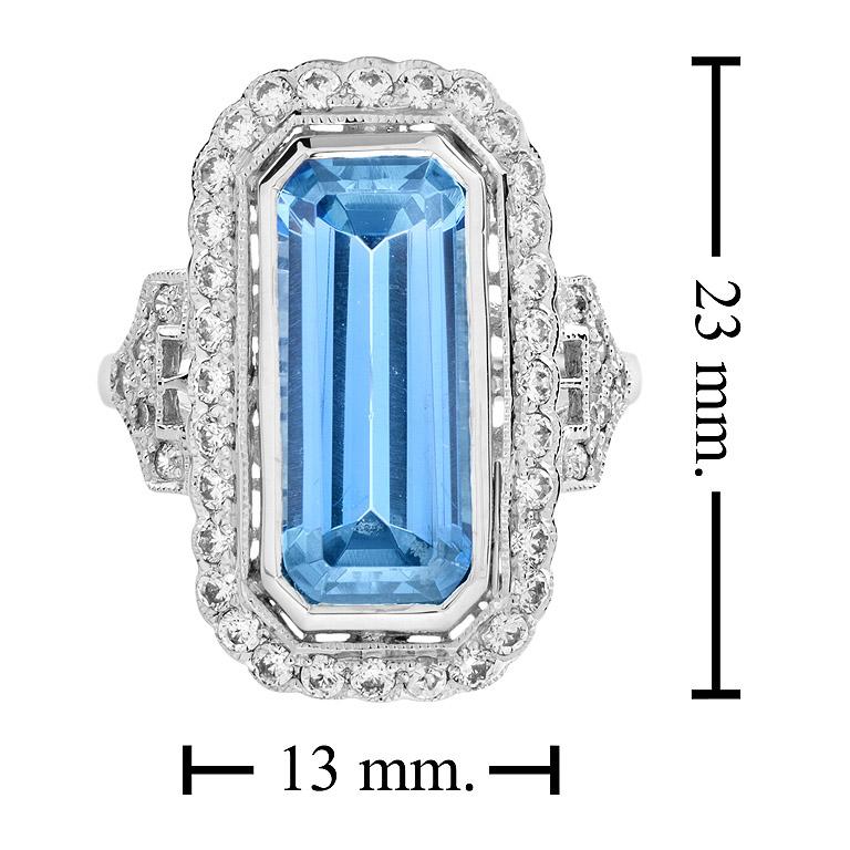 For Sale:  Halona Emerald Cut Blue Topaz with Diamond Halo Ring in 18K White Gold 6